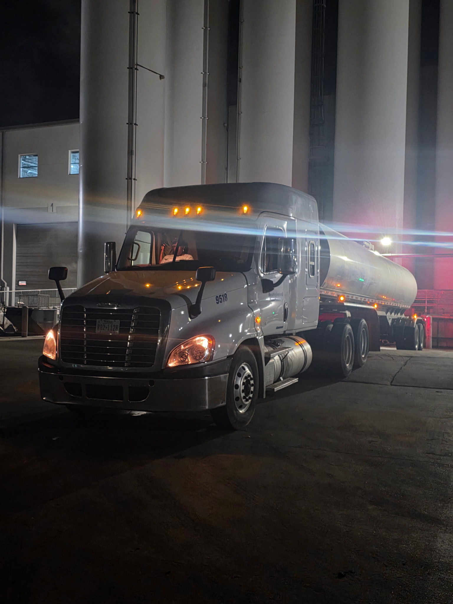 DOT commercial truck inspection at a 1 South Central Gulf Coast yard at night
